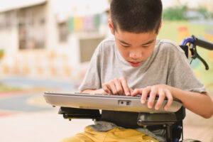a student with an aac device