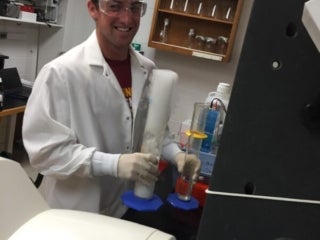Lab member conducting an experiment