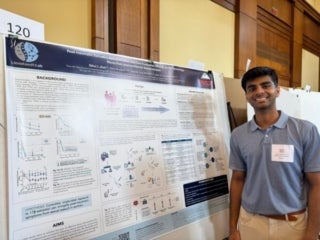 Rahul in front of his poster Celebration of Undergraduate Research