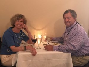Two alumni sitting at a table over dinner Jeanie VanWinkle PhD and Barry VanWinkle PhD This photo taken in 2017 on Barry's birthday