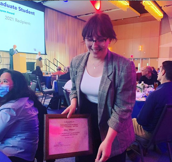 Anna W with award 2021 at conference