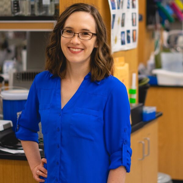 Rebecca Pollet in blue shirt in lab
