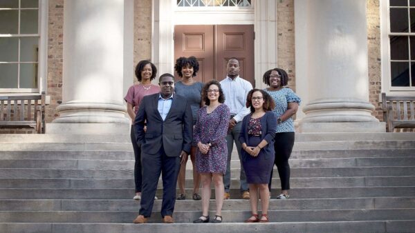 2021-23 CPPFD scholars pose in front of South Building. Back row: Patrece Joseph, Kayla Fike, Earnest Taylor, Tamera Hughes. Front row: Edem Klobodu, Daniella Reboucas and Jamilläh Rodriguez. (Photo by Megan May/UNC Research)