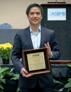 Greg Wang with award