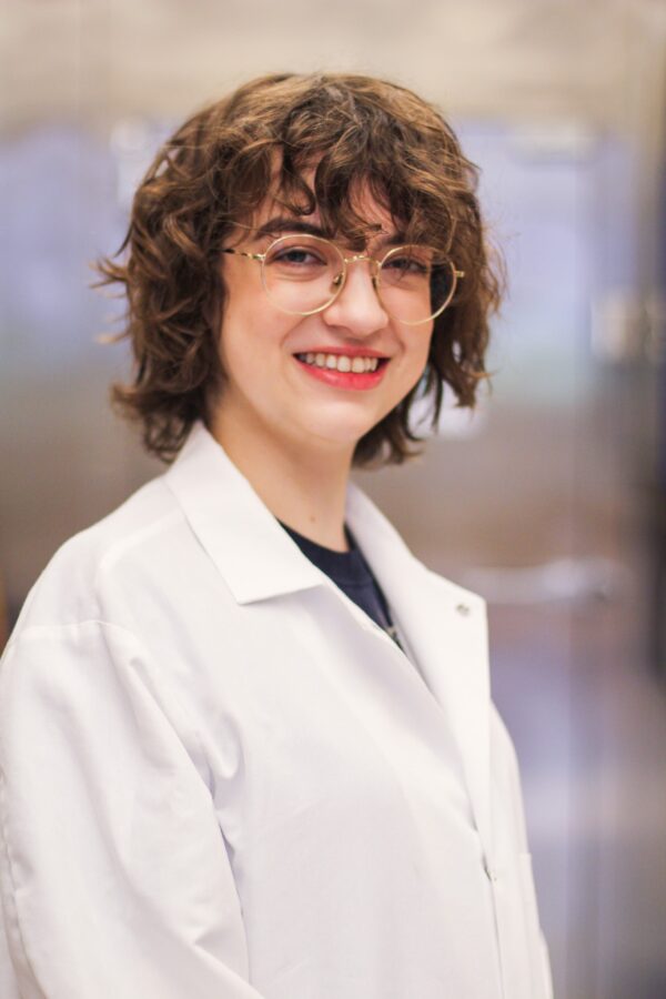 Rebecca Stowe in lab coat