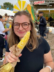 Enjoying corn on the cob at the state fair, an annual favorite tradition