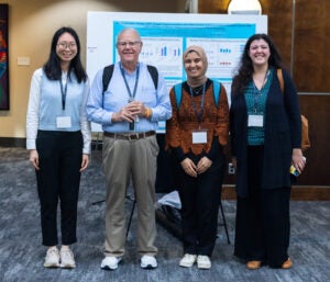 Lineberger trainee day 2025 Bernard Weissman, PhD and the 3 winners of awards for best presentations in Clinical and Population Sciences, Translational Sciences and Basic Sciences