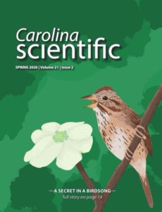 "Carolina Scientific Magazine, SPRING 2026 | Volume 21 | Issue 2 —A SECRET IN A BIRDSONG—full story on page 14" image has a green tree cover with a small brown bird and a white flower