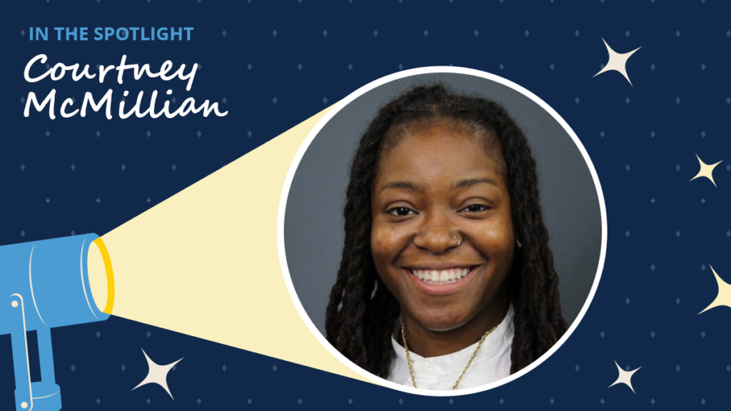 Navy blue background has diamonds and starbursts. A spotlight icon shines on a circular image of Courtney McMillian. A label reads "In the spotlight." Below the label is the text "Courtney McMillian."
