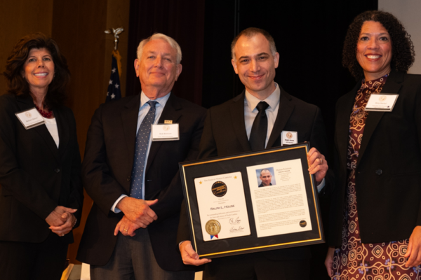 Dr. Ralph House is pictured receiving the 2023 Governor's Award for Excellence