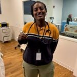 Eithar with her stethoscope at the medical simulation lab.