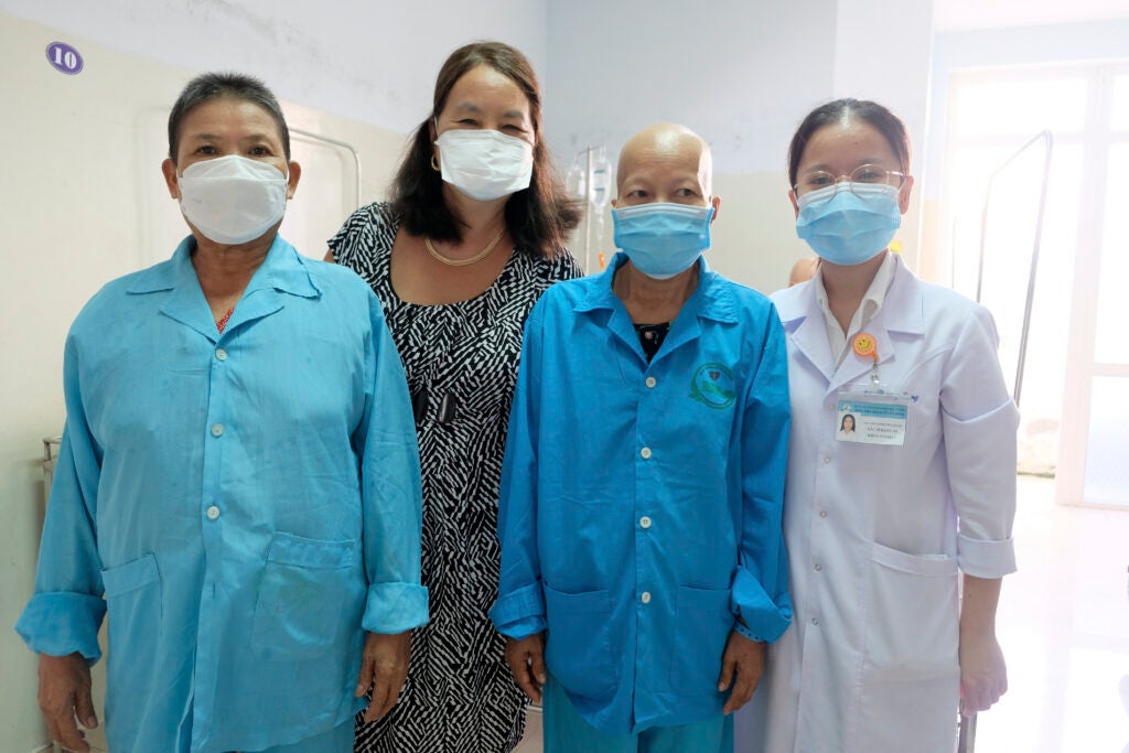 Dr. Van Le and cancer patients at Danang Oncology Hospital
