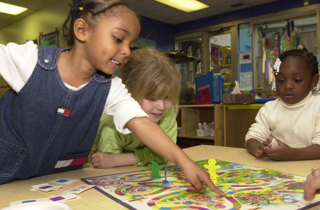 Children play together.
