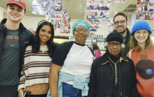 UNC students in Linking Generations in Northside (LINK) and the Northside Residential Fellowship (NRF) celebrating the end of the semester with program coordinators Aisha Booze-Hall and Ryan Lavalley and Northside neighbor and NRF/LINK Resident Leader Ms. Louise Felix.