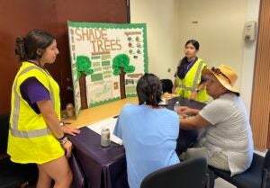 Interns share their research on street trees at Walk Fairview Day 2023