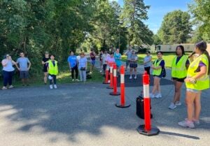 Interns share desired improvements with policymakers at Walk Fairview Day in August 2023.