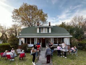 A community gathering at the 308 Lindsay Street house and project with the Marian Cheek Jackson Center
