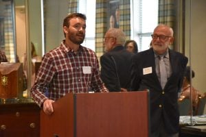 Antoine Bailliard, PhD, OTR/L, speaks at the Class VI graduation, held on August 23, 2018 at the George Watts Hill Alumni Center. Ronald P. Strauss, the University's executive vice provost, looks on.