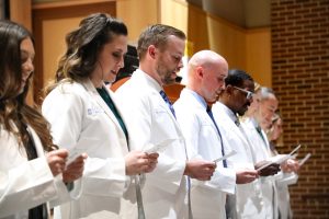 Incoming Physician Assistant Studies students recite the Hippocratic Oath.