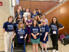 HEELS 2 Transition Summer 2025 group shot on the stair of Bondurant Hall. Group of participants along with faculty and students.