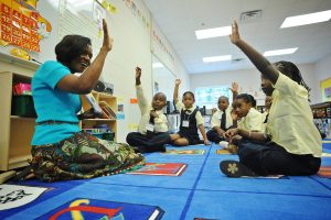 First grade teacher Agatha Brown interacts with her pupils at Union Independent School in Durham, NC.