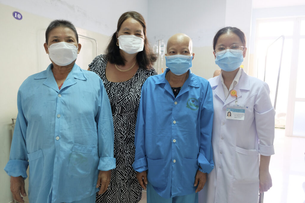 Dr. Van Le and cancer patients at Danang Oncology Hospital