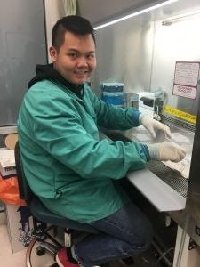 Close-up shot of Tuong Nguyen in a laboratory