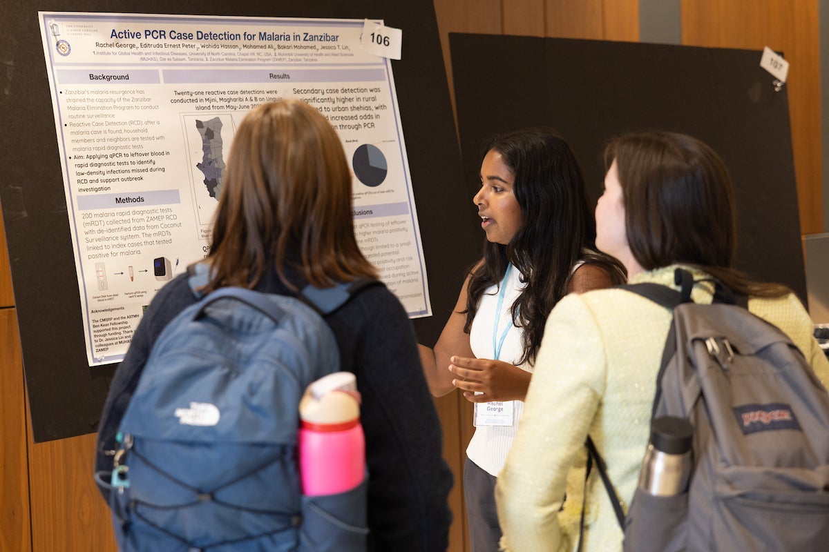 Student presenting poster at 2025 Student Research Day