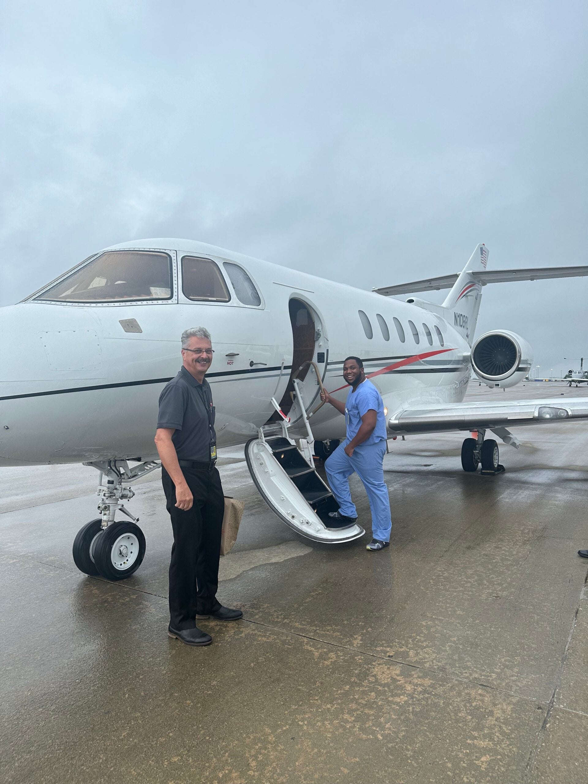 Joshua Walker boarding a private jet.