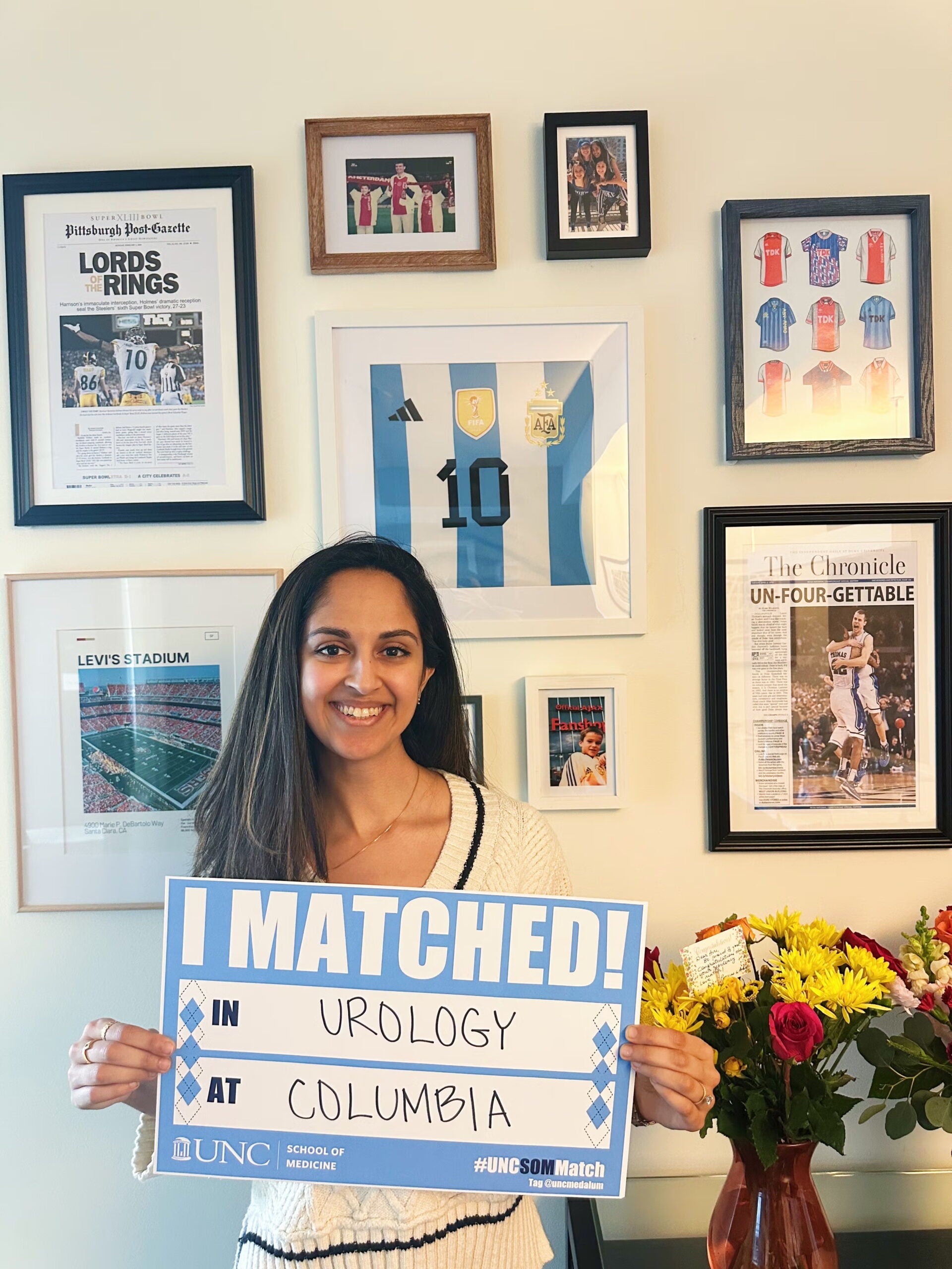 Avani Desai holding her Match Day sign.