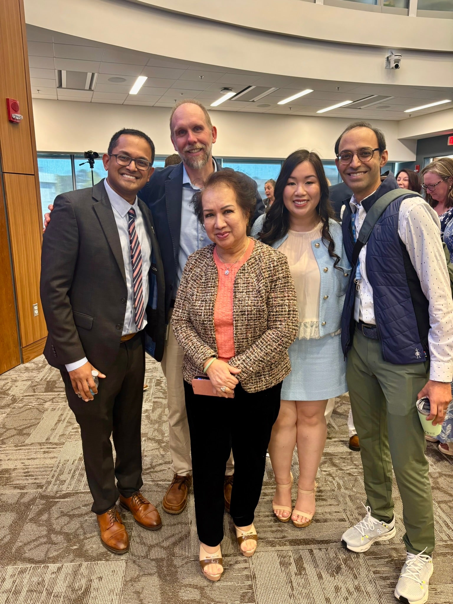 Carolina Vo and her mother at Match Day with a few of her mentors.