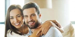 A Man and Female Spouse Smile
