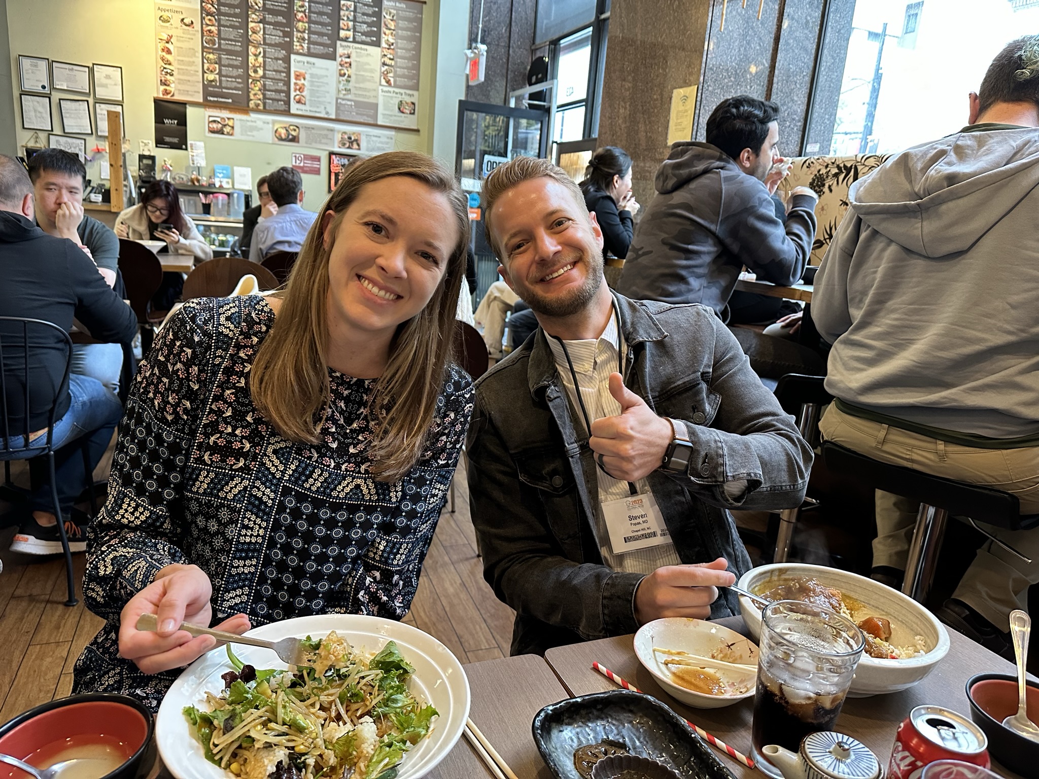 Dr. Steven Papas and Dr. Michaela Squire - thumb up for eel sushi and fried tofu 