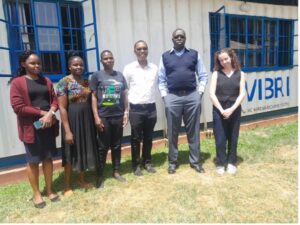 Members of Dr. Mungo’s UNC–Kenya research team together with colleagues in front of the Victoria Biomedical Research Institute (VIBRI).