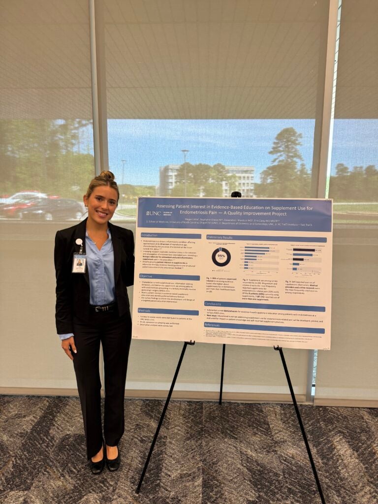 Megan Little, UNC Medical Student pictured with her research poster