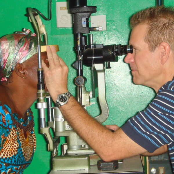 UNC Eye Chair Donald L. Budenz, MD, MPH treats a patient in Ghana