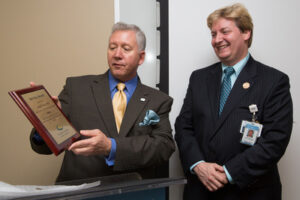 Dean Vavra Presents Award to C. Fowler