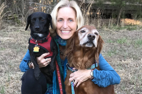 Photo of Ellen Ozier with her two dogs