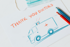 Drawing of an ambulance that says Thank You Doctors