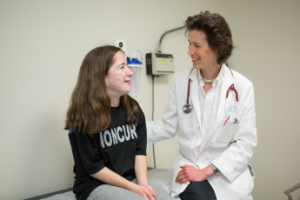 Dr. Muhlebach with clinic patient
