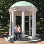 Dr. Chitra Saran with her husband at the UNC Old Well
