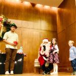 Santa, helper and kids at Annual Awards Holiday Party 2022