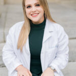Amanda Graboski in her Pharmacology White Coat