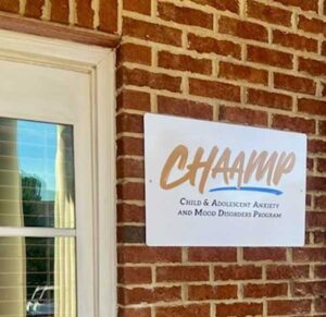 CHAAMP logo outside of building