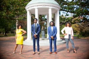 picture of the executive board members in front of the Old Well (Lakeya Hardy (leftmost), Xavier Bonner (2nd from left), Brea Hampton (rightmost), Drevon Dobson (2nd from right))
