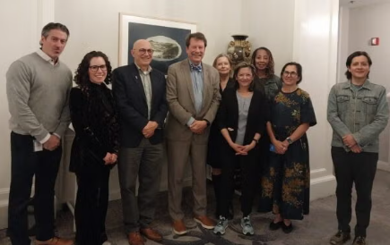Members of the UNC Department of Social Medicine stand for a photo with the Center for Bioethic's 45th Merrimon Lecture speaker Dr. Robert Califf.