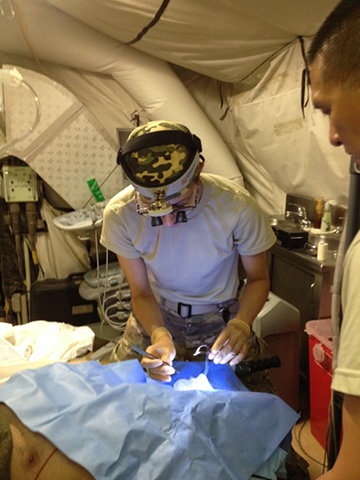 Dr. Amy Alger treating soldiers in Afghanistan