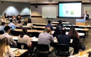 Attendees listening to presentation