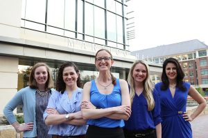 UNC & Duke AMPWIS leadership teams working together through a Kenan-Biddle Partnership Grant. Brooke Matson, Kate Hacker, Audrey Verde, Amy Wisdom, and Melodi Whitley. Photo by Max Englund/UNC Health Care.