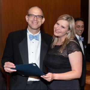 Dr. Sophie Spencer receives diploma from Dr. Eric Wallen